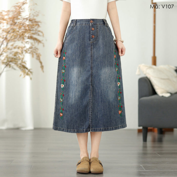 Chân váy denim lưng thun thêu hoa lá đối xứng vạt xẻ - V107