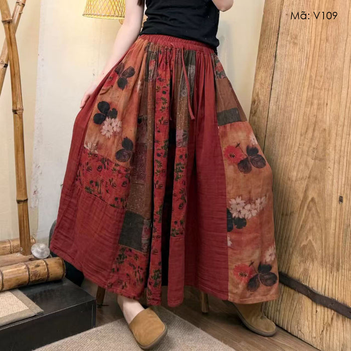 Chân váy xòe lưng thun in hoa lá phối mảng miếng - V109