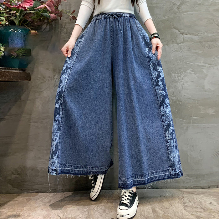 Quần baggy denim lưng thun ống rộng in hoa lá hai bên - NU9759