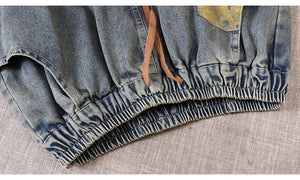 Chân váy denim lưng thun túi phối vải hoa - NU10103