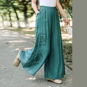 Quần baggy linen lưng cao thun thêu hoa văn tròn retro - NU10517