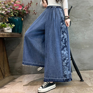 Quần baggy denim lưng thun ống rộng in hoa lá hai bên - NU9759