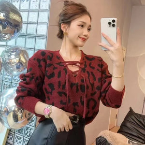 Áo len cashmere dài tay cổ V đan dây hoa văn trừu tượng - A372