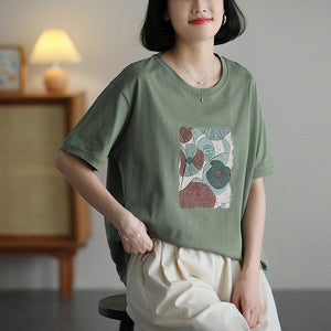 Áo T-shirt ngắn tay cổ tròn in hoa trừu tượng - NU10136
