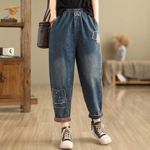 Quần baggy denim lưng thun ống côn thêu hoa trừu tượng - NU10349