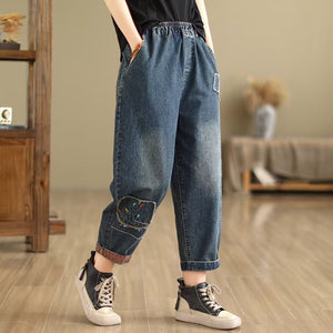 Quần baggy denim lưng thun ống côn thêu hoa trừu tượng - NU10349