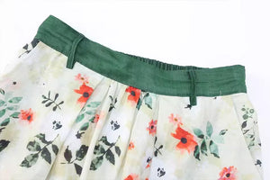 Chân váy linen retro lưng cao in hoa lá hai túi chéo - NU9047