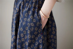 Chân váy linen retro lưng thun túi chéo in hoa cúc liti - NU9156