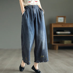 Quần baggy denim lưng cao ống rộng thêu hoa văn - NU8886